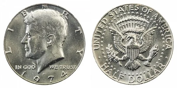 1974 Kennedy Half Dollar obverse showing JFK portrait with D mint mark and reverse showing Presidential Seal eagle — a copper-nickel clad coin with conditional rarity in top grades